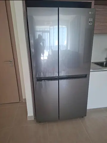 Lg brand side by side door refrigerator neat and clean condition