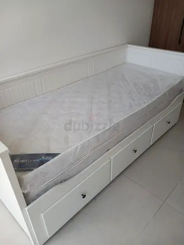 Ikea White wooden daybed with storage drawers and mattress