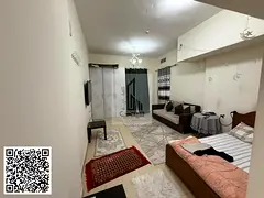 Furnished studio apartment for rent with balcony and private parking.