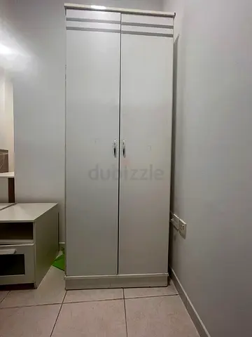 Slim White 2-Door Wardrobe — Good Condition, Compact Size