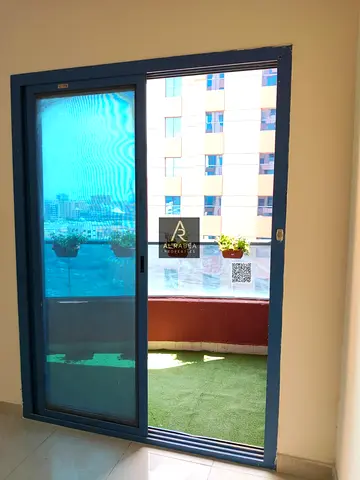 For annual rent in Ajman, in Al Nuaimiya Towers: one bedroom, living room, two bathrooms, open view