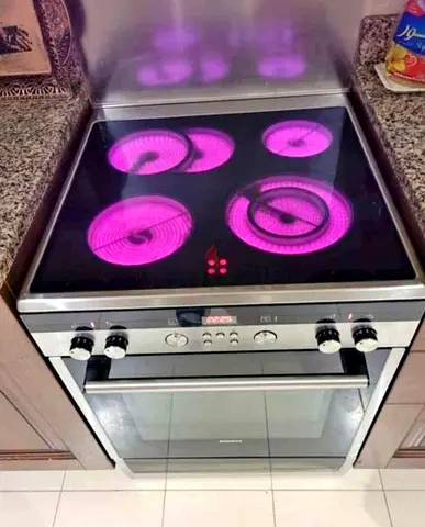 Siemens iQ300 electric ceramic cooker featuring four cooking zones and a digital display.