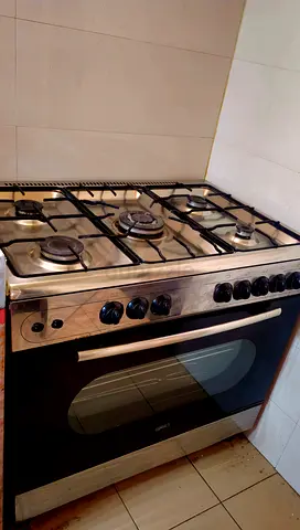 5-burner Stainless Steel Gas Range with Oven - Good Working Condition