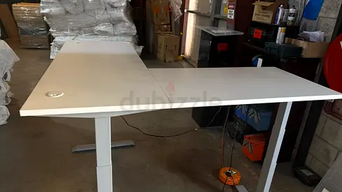 L-shaped White height adjustable desk