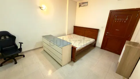 Bedroom with attached balcony for family or couples in Al Rigga