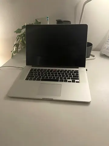 Used 15-inch MacBook Pro Retina 2012 (Silver) with Charger - Good Condition