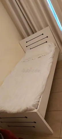 Single white wooden bed frame with headboard and footboard along with mattress good condition.