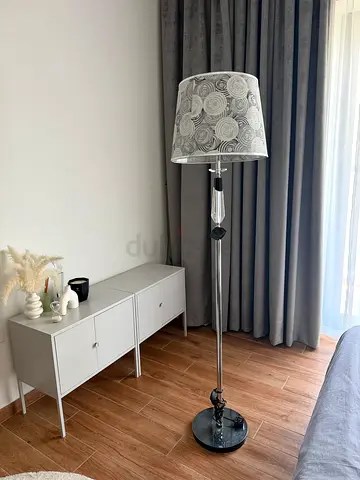 Chrome floor lamp with patterned white shade - good condition