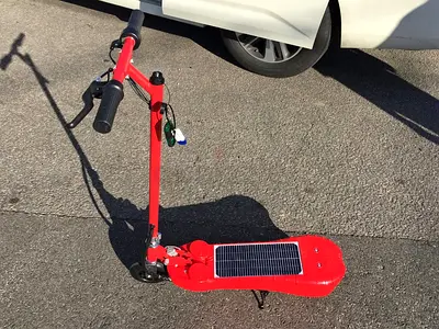 36 v photon foldable solar cum electric scooter