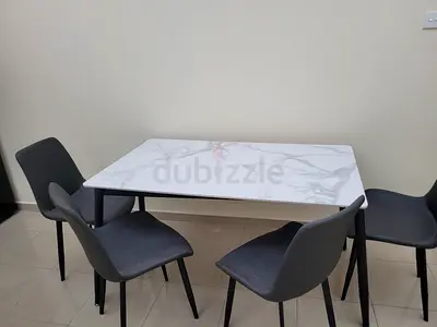Modern Marble-Top Dining Table with 4 Grey Chairs - Light Use