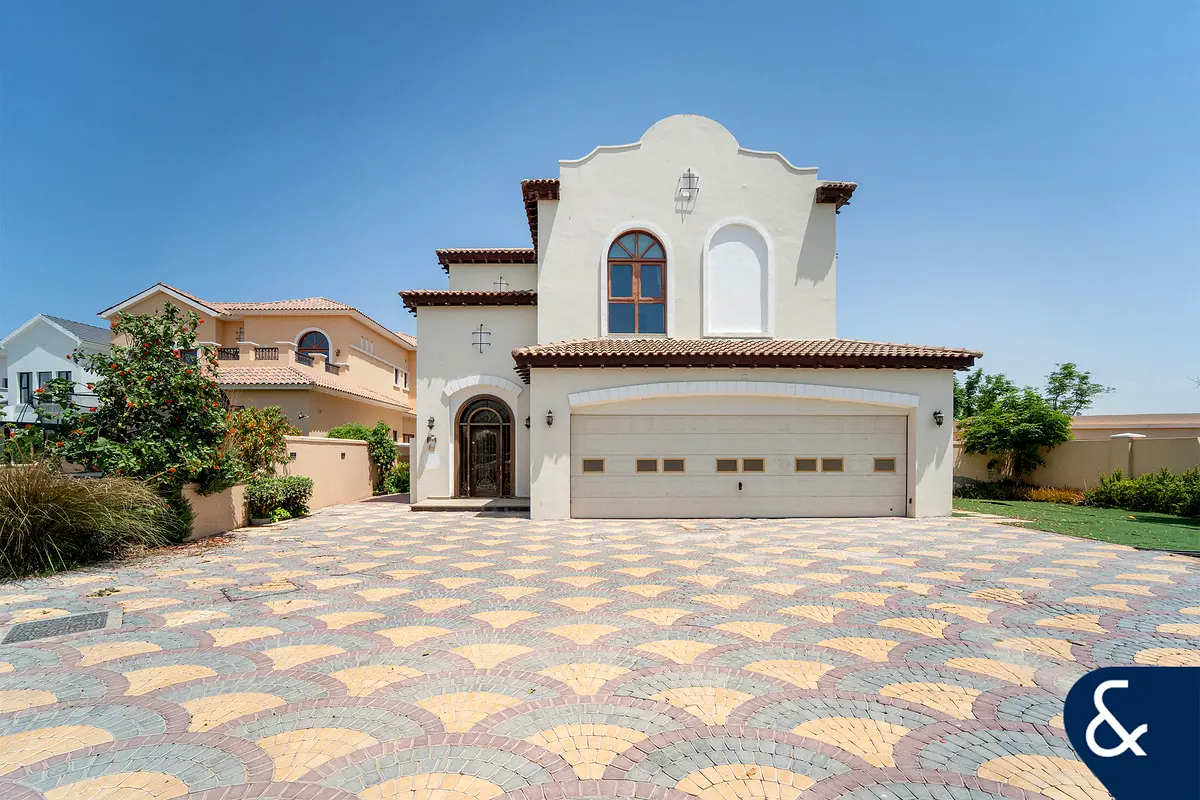New Listing - Corner Unit with Golf and Lake View