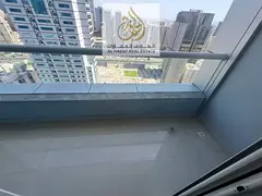1BHK with balcony in Al Taawun, direct Dubai exit, gym, swimming pool, and postal insurance.