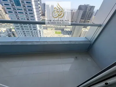 1BHK with balcony in Al Taawun, direct Dubai exit, gym, swimming pool, and postal insurance.