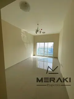 Two bedrooms and a large living room in Ajman