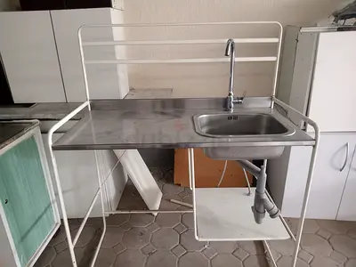IKEA Compact stainless steel single-bowl sink unit with white steel frame and tab
