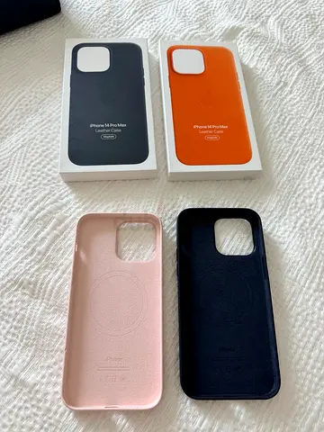2 Apple Iphone 14 ProMax Original Leather Cases Black  Orange and 2 Silicon Cases Black  Pink
