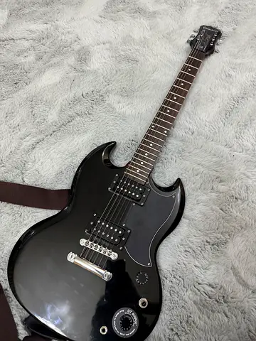 Black Epiphone SG with gig bag