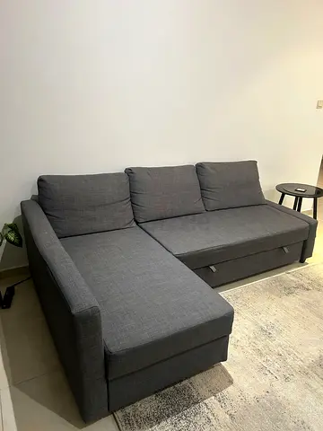 Grey L-shaped Fabric Sofa bed - Good Condition