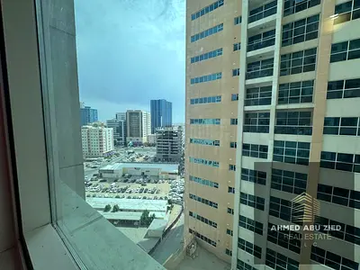 Fully furnished studio for annual rent in Ajman One Towers, Al Rashidiya 3, very large space, equipped kitchen, wall closets, central air conditioning