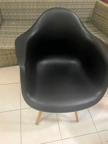 Modern Black Molded Plastic Armchair with Wooden LegsRattan Sofa – Very Durable.