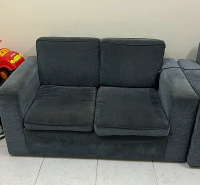 2-seater dark grey fabric sofa - good condition