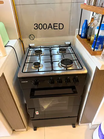 4-Burner Gas Cooker with Oven - Good Condition (300 AED)