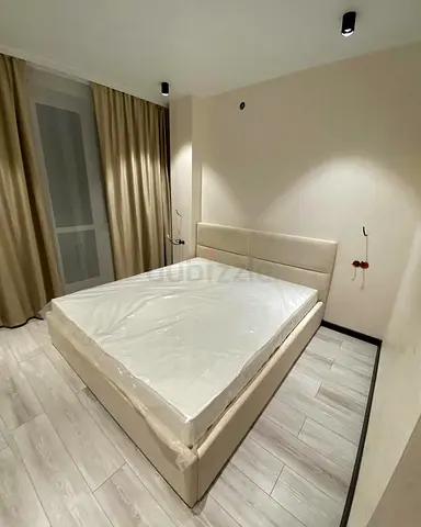 Beige Upholstered Double Bed with Headboard