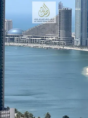 in Al Taawun, 3BHK,3 bathrooms, maid's room, water view, balcony, wardrobe, gym and swimming pool, close to Dubai exit