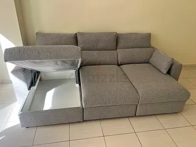 Ikea Eskelstuna L shape sofa bedLight grey L-shaped storage sofa with chaise lounge - good condition