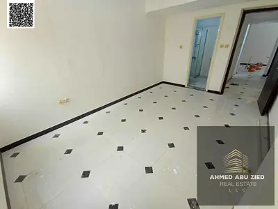 Second-tenant luxury apartment with 2 master bedrooms, spacious living room, equipped kitchen, and 3 bathrooms. Near Sheikh Ammar Street. Close to ser
