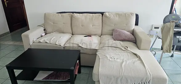 Light beige L-shaped fabric sofa with chaise, good condition