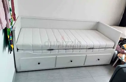 IKEA Hamnes Day bed with 3 storage drawers underneath and with 2 IKEA mattresses