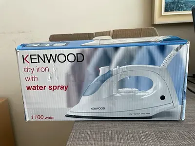 Kenwood Iron with water spray - Needs Base Cleaning (AED 15)