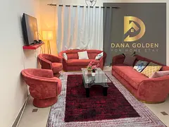 Furnished one-bedroom apartment with living room, two bathrooms, and balcony for rent in Al Nahda ar