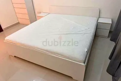 Ikea king size askovol bed frame and Ikea mattress is available