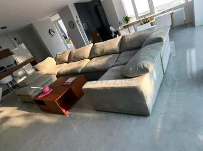 In great condition Pan Emirates Pianca Modern Corner Feather Filled U Shape Sofa with ottoman