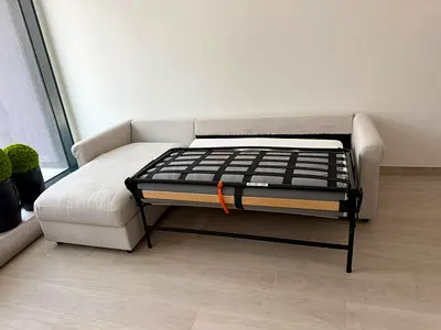 Ikea Gronlid L shape sofa bed BeigLight beige L-shaped sofa with pull-out guest bed - good condition