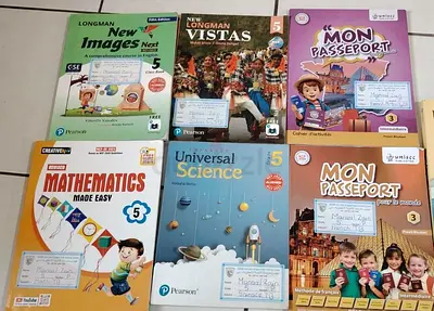 Set of 6 School Textbooks and Workbooks - Grades 3  5 (English, Math, Science, French)