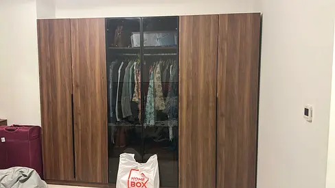 Large Wooden Wardrobe / Armoire with Glass Center Panels - Good Condition Hardly used.