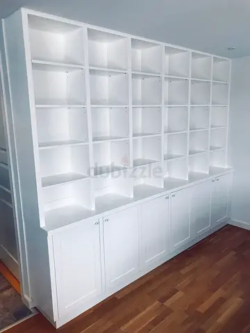 Large Custom White Built-in Bookshelf with Lower Cabinets