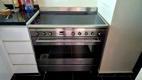 Smeg Stainless Steel Electric Range with Ceramic Hob and Large Oven - Good Condition
