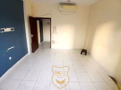 Spacious 1BHK in Al Musalla, Sharjah – Free Parking | Central AC & Gas