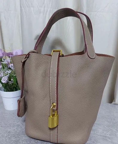 Taupe Leather Bucket Handbag with Gold Padlock