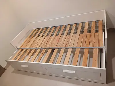 Ikea White wooden daybed frame with storage drawers