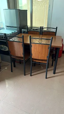 Compact 4-Seater Dining Table Set with Metal Frame and Wood Finish