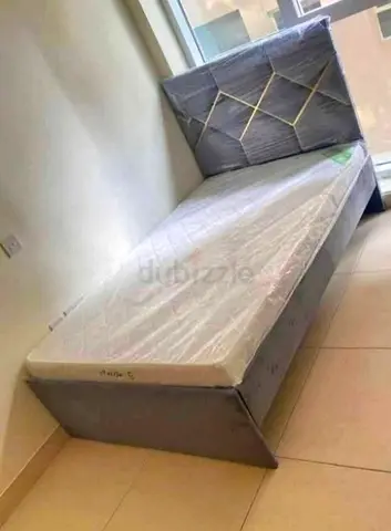 Single bed with upholstered headboard and mattress - like new