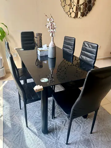 Glass dining table with 6 Faux Leather chairs for URGENT SALE
