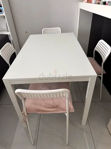 table with 4 chairs For sale at a great offer