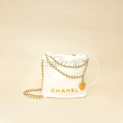 Authentic Chanel White 22 Shiny Mini Bag