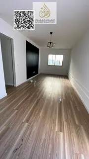 Two-bedroom apartment with a private roof terrace for annual rent in Al Jurf 3 area